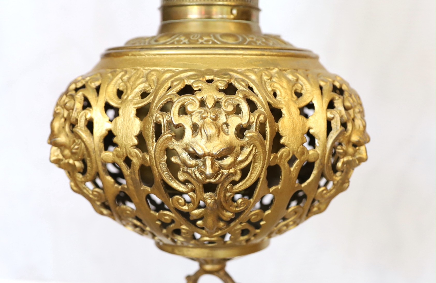 A late 19th century English pierced brass green onyx and glass lamp standard etagere, height overall 154cm, width 48cm